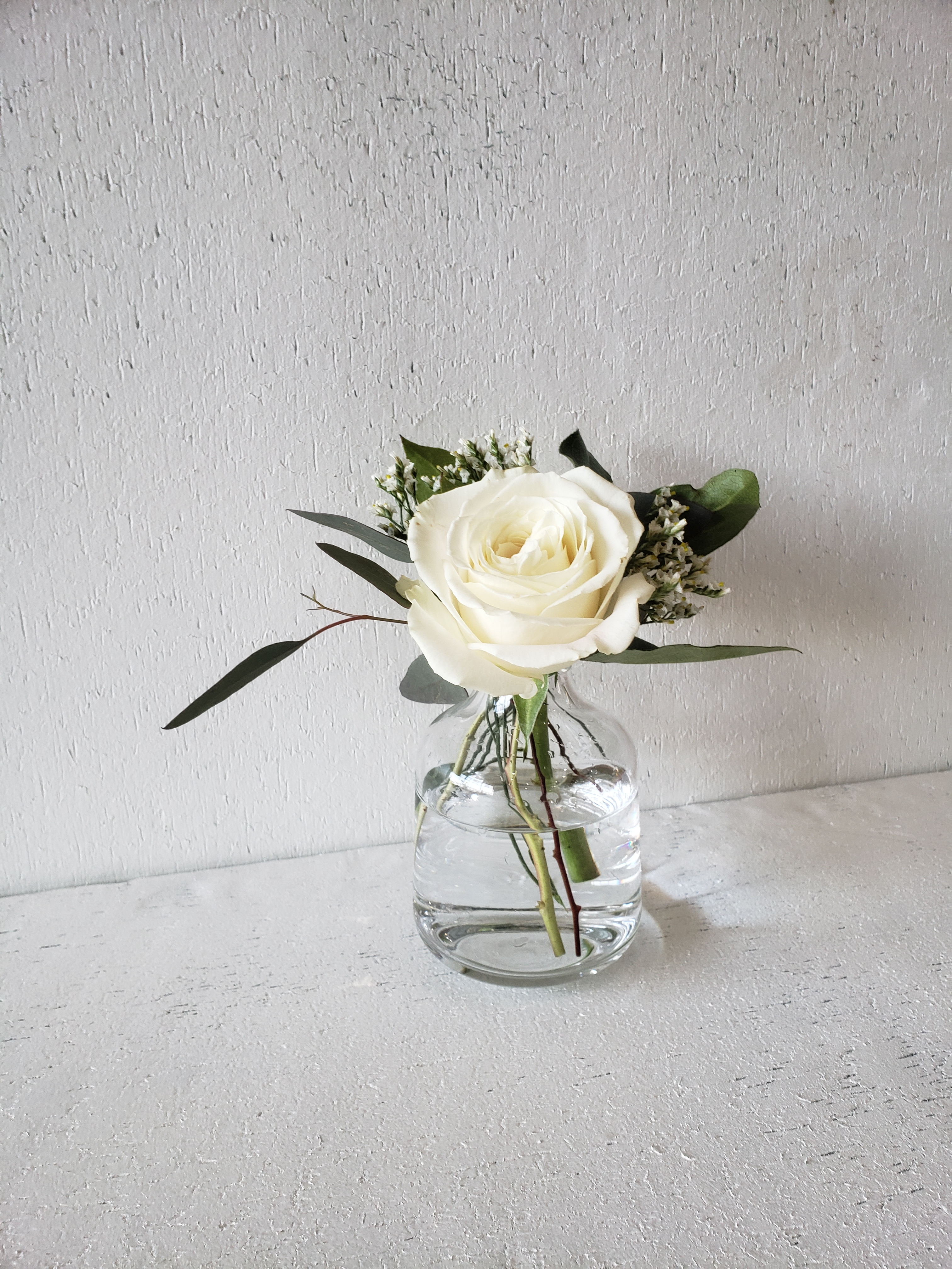 Clear Glass Bud Vase with Cream Bloom